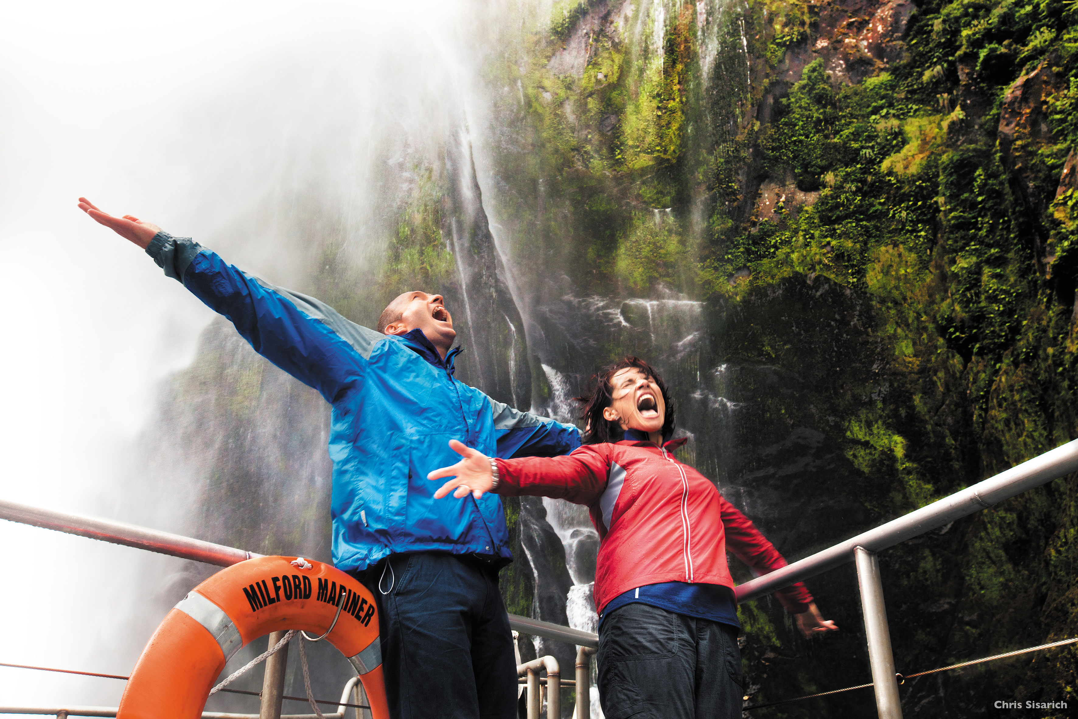 Milford Sound Overnight Cruise Travellers Smiling thumbnail